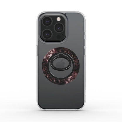 Ring holder magnetico applicato su iPhone con cover trasparente, design marmo nero e riflessi bordeaux, elegante e deciso.